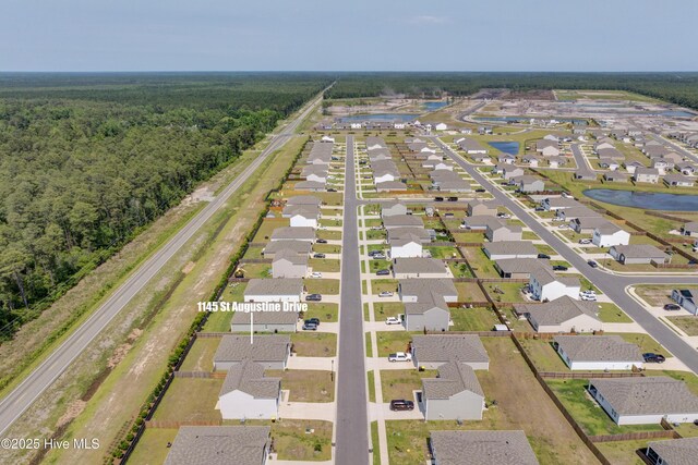 1145 Saint Augustine Dr, Castle Hayne, NC 28429 - aerial view of residential area with a forest