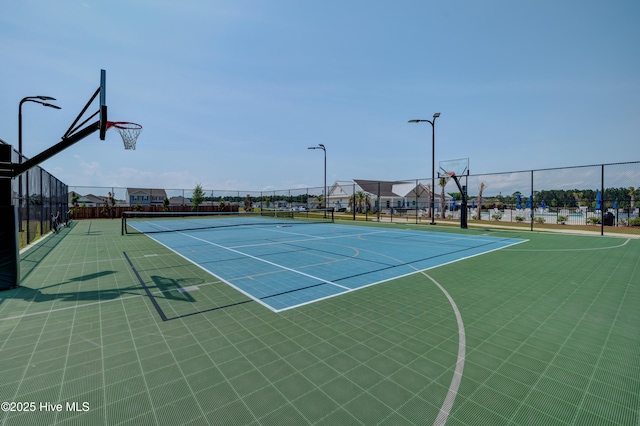 1145 Saint Augustine Dr, Castle Hayne, NC 28429 - view of tennis court featuring community basketball court