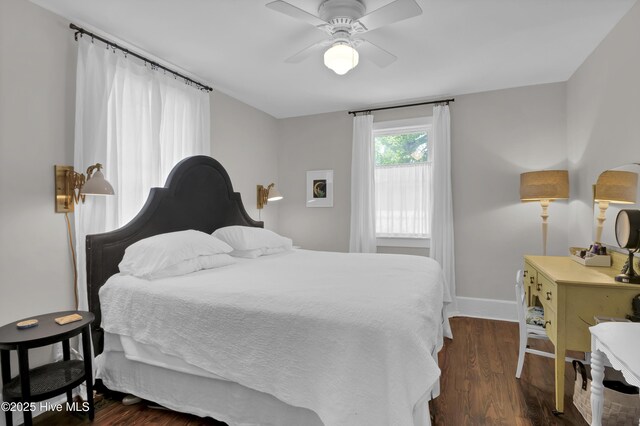 416 S 8th St, Wilmington, NC 28401 - bedroom with dark wood finished floors, baseboards, and a ceiling fan