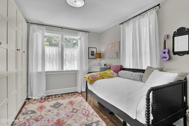 416 S 8th St, Wilmington, NC 28401 - bedroom with baseboards and wood finished floors