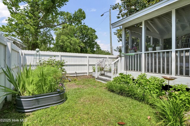 416 S 8th St, Wilmington, NC 28401 - view of yard featuring a sunroom