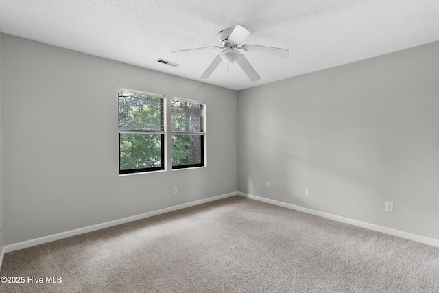 935 Birch Creek Dr, Wilmington, NC 28403 - spare room with carpet floors, a ceiling fan, and a textured ceiling