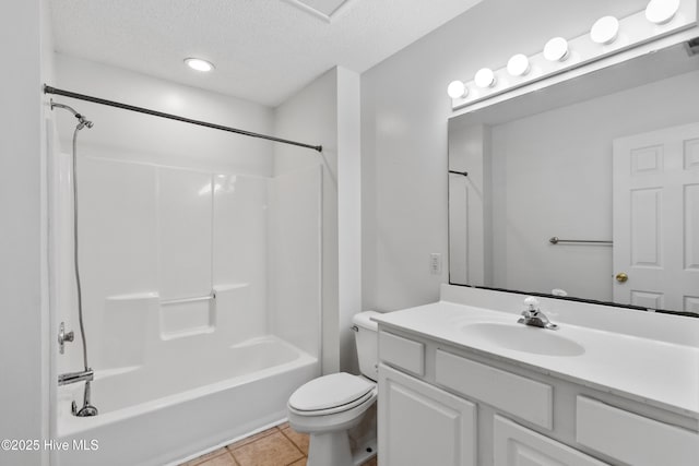 935 Birch Creek Dr, Wilmington, NC 28403 - bathroom with vanity, a textured ceiling, tile patterned flooring, and tub / shower combination