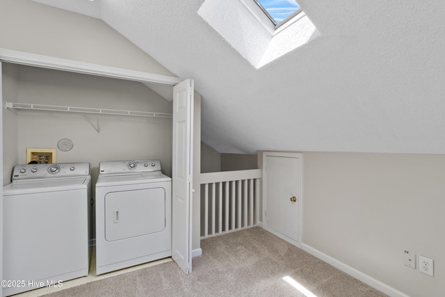 935 Birch Creek Dr, Wilmington, NC 28403 - laundry area featuring a skylight, washing machine and dryer, and light colored carpet