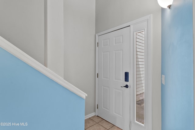 935 Birch Creek Dr, Wilmington, NC 28403 - foyer entrance featuring light tile patterned floors and baseboards