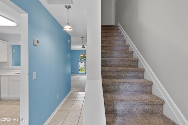 935 Birch Creek Dr, Wilmington, NC 28403 - stairs featuring tile patterned flooring and baseboards