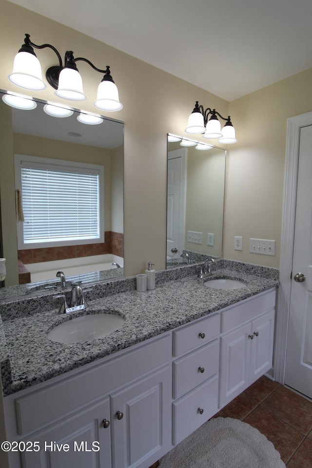 full bathroom with tile patterned flooring and double vanity