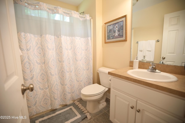 full bathroom featuring tile patterned flooring, toilet, vanity, and a shower with curtain