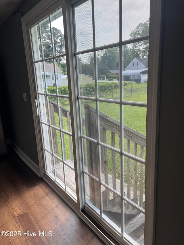 527 Chicora St, Grimesland, NC 27837 - entryway with healthy amount of natural light, wood finished floors, and baseboards