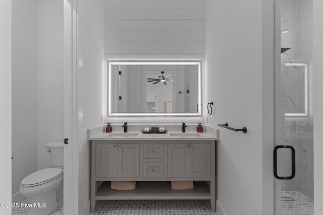 9213 Rivendell Pl SW, Calabash, NC 28467 - bathroom with a marble finish shower, toilet, double vanity, and a ceiling fan