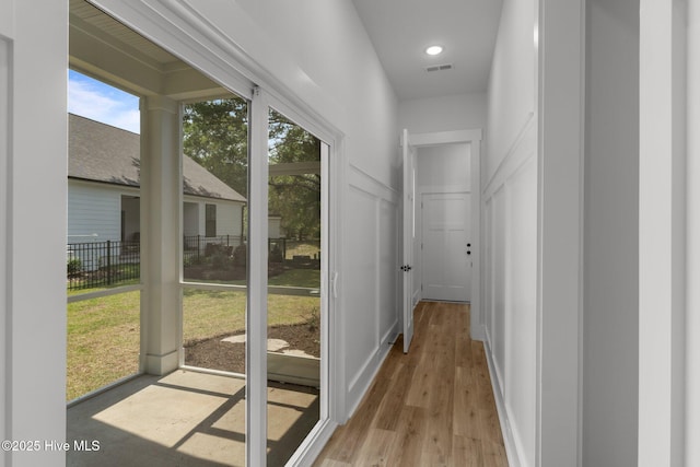 9213 Rivendell Pl SW, Calabash, NC 28467 - corridor featuring light wood-type flooring and a decorative wall