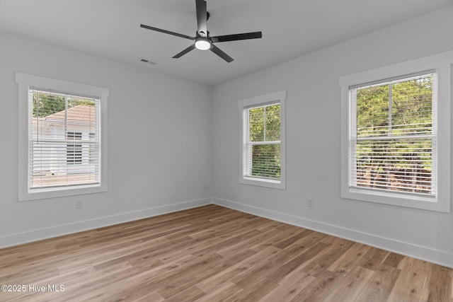 9213 Rivendell Pl SW, Calabash, NC 28467 - spare room with light wood finished floors, baseboards, and ceiling fan