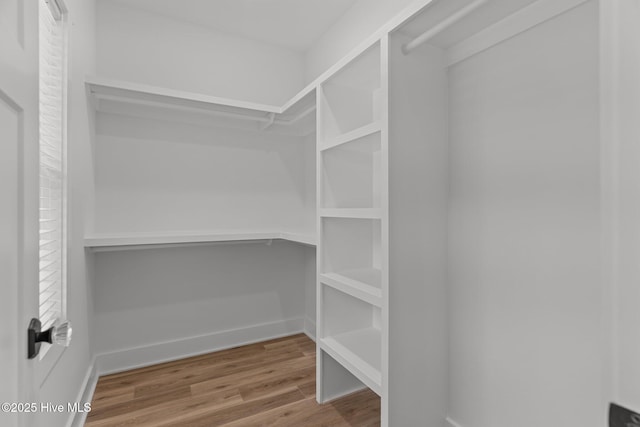 9213 Rivendell Pl SW, Calabash, NC 28467 - spacious closet featuring wood finished floors
