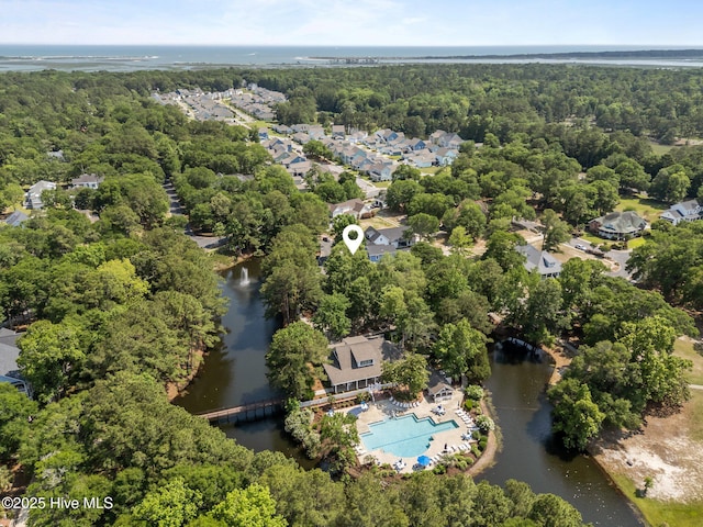 9213 Rivendell Pl SW, Calabash, NC 28467 - drone / aerial view of a large body of water, a pool, and a heavily wooded area