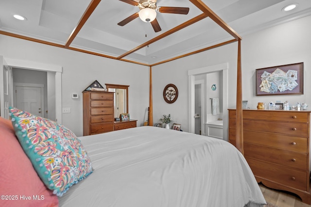 bedroom with recessed lighting, connected bathroom, wood finished floors, and ceiling fan