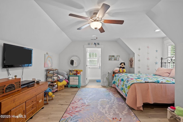 bedroom with multiple windows, light wood-style flooring, lofted ceiling, ceiling fan, and recessed lighting