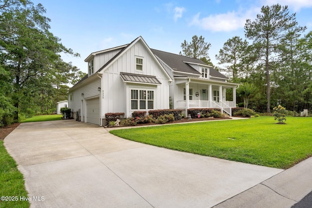 modern farmhouse style home featuring covered porch, board and batten siding, concrete driveway, a garage, and a front yard