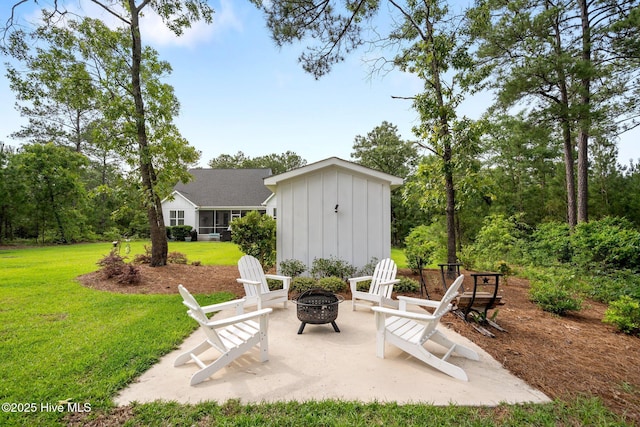 view of patio / terrace with an outdoor fire pit