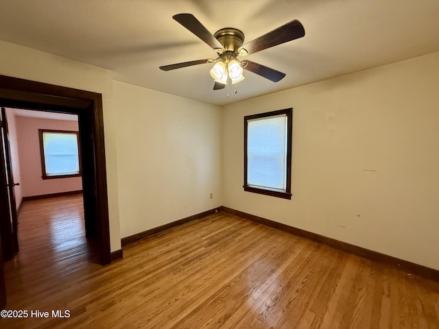 208 W Gray St, Windsor, NC 27983 - empty room featuring baseboards, wood finished floors, and a ceiling fan