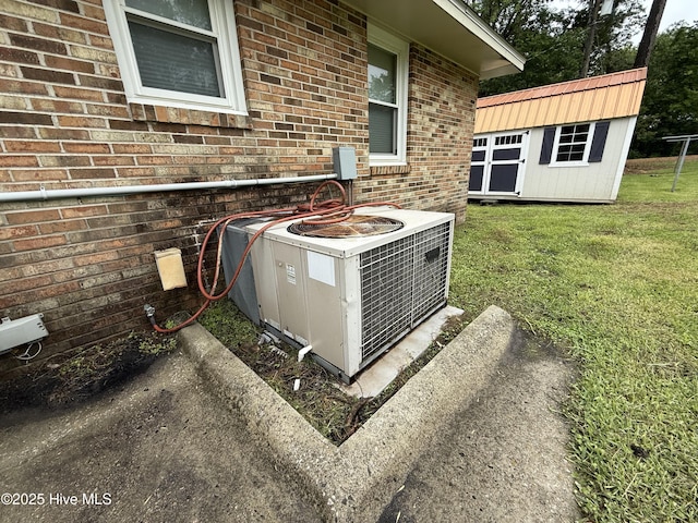 208 W Gray St, Windsor, NC 27983 - exterior view of central AC unit and brick siding
