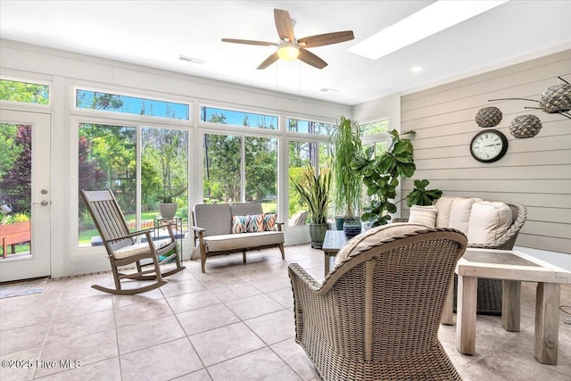 1013 Dowling Ct, Leland, NC 28451 - sunroom / solarium featuring french doors, tile patterned flooring, wooden walls, and a skylight