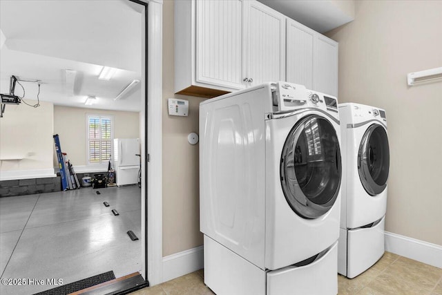 1013 Dowling Ct, Leland, NC 28451 - laundry room featuring cabinet space, washer and dryer, and baseboards