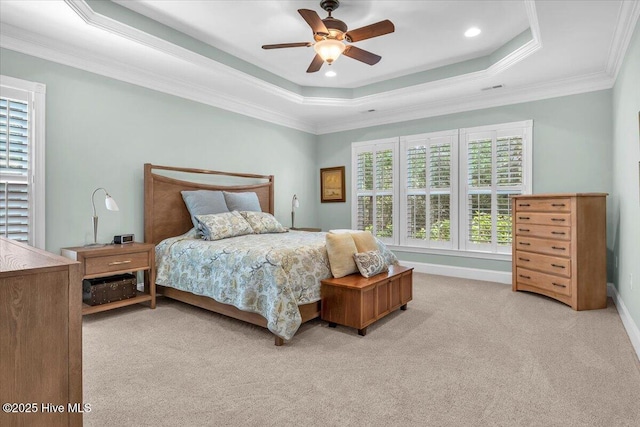 1013 Dowling Ct, Leland, NC 28451 - bedroom featuring light carpet, a raised ceiling, crown molding, a ceiling fan, and baseboards