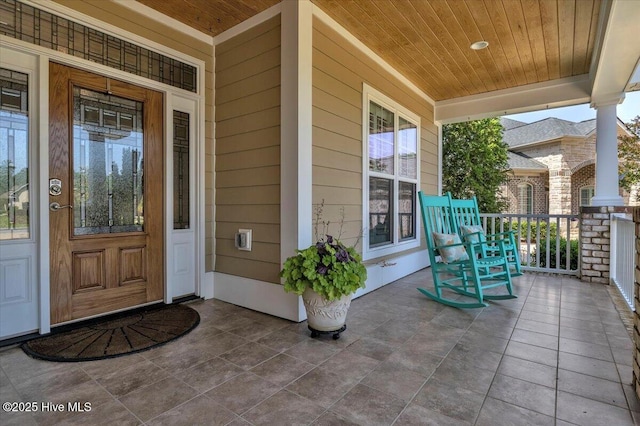 1013 Dowling Ct, Leland, NC 28451 - property entrance with a porch