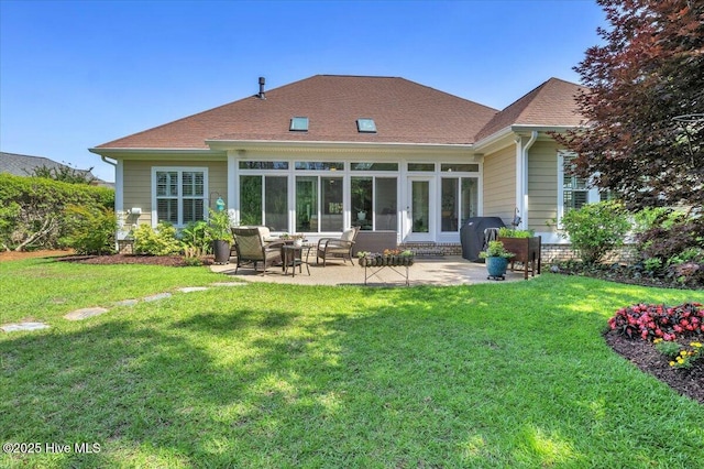 1013 Dowling Ct, Leland, NC 28451 - rear view of house with a patio area, a lawn, and roof with shingles
