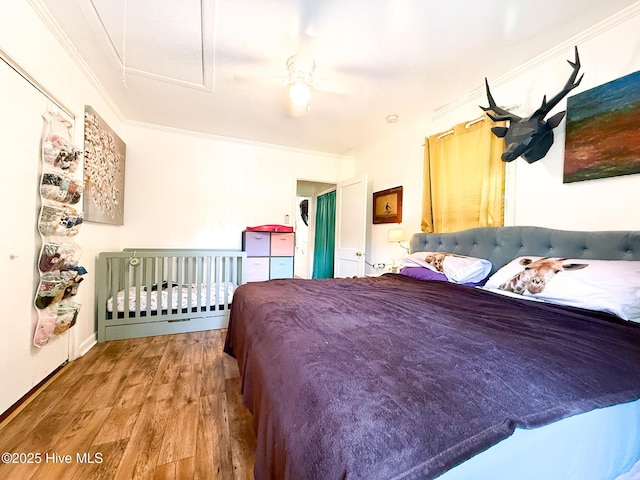1605 E Holly St, Goldsboro, NC 27530 - bedroom with wood finished floors, ornamental molding, and ceiling fan