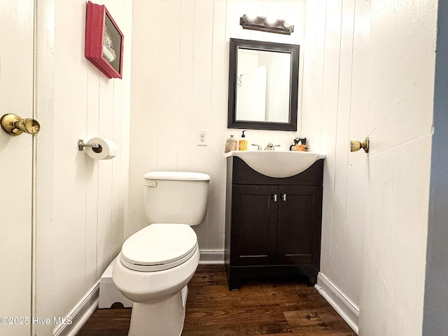 1605 E Holly St, Goldsboro, NC 27530 - bathroom with wood finished floors and vanity
