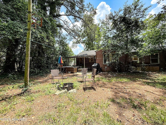 1605 E Holly St, Goldsboro, NC 27530 - view of yard featuring a fire pit and a patio