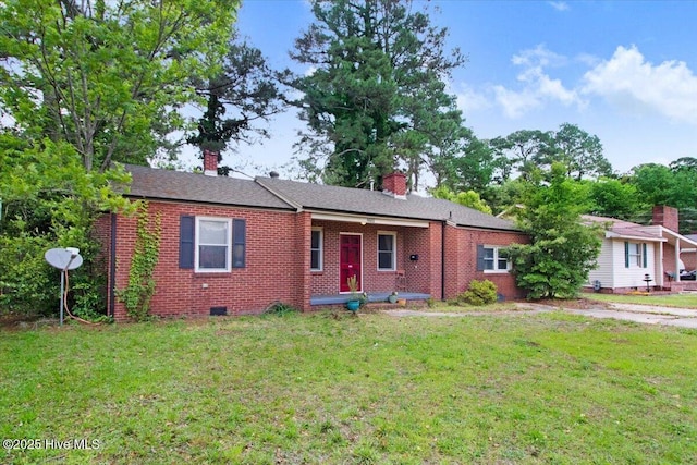 1605 E Holly St, Goldsboro, NC 27530 - ranch-style home featuring brick siding, crawl space, a front lawn, and a chimney