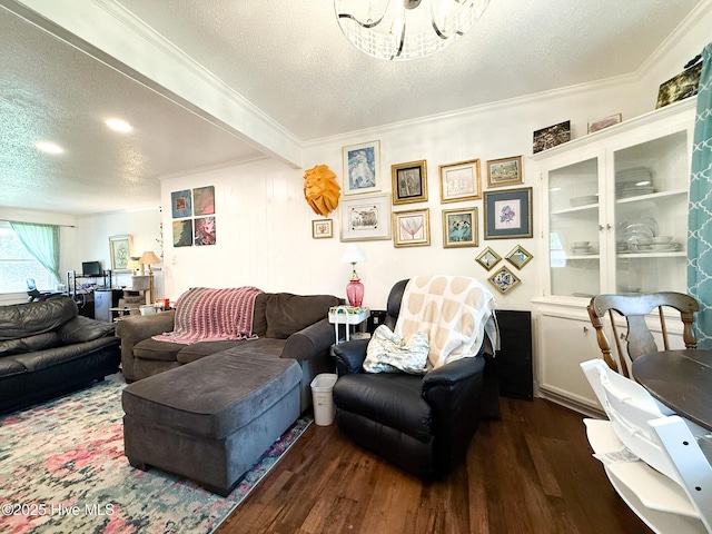 1605 E Holly St, Goldsboro, NC 27530 - living room with dark wood-type flooring, crown molding, a textured ceiling, and a chandelier
