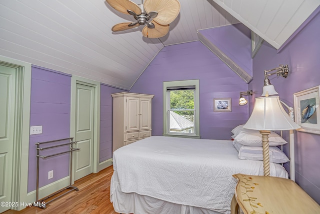 659 Wash Woods Way, Bald Head Island, NC 28461 - bedroom featuring light wood-style flooring, lofted ceiling, ceiling fan, and baseboards