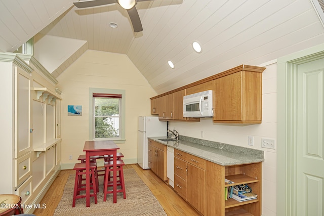 659 Wash Woods Way, Bald Head Island, NC 28461 - kitchen with white appliances, light wood-type flooring, a sink, a ceiling fan, and lofted ceiling