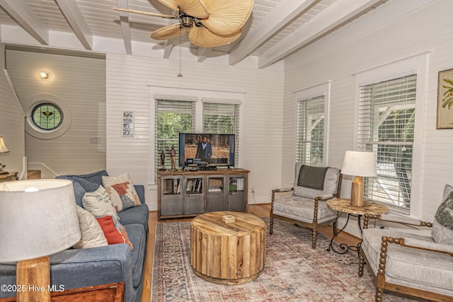 659 Wash Woods Way, Bald Head Island, NC 28461 - living room with ceiling fan, beamed ceiling, wood finished floors, and plenty of natural light