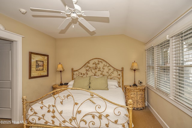 659 Wash Woods Way, Bald Head Island, NC 28461 - bedroom with lofted ceiling, carpet, ceiling fan, and baseboards