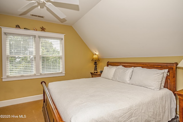 659 Wash Woods Way, Bald Head Island, NC 28461 - bedroom with lofted ceiling, baseboards, and ceiling fan