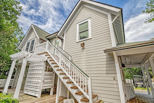 659 Wash Woods Way, Bald Head Island, NC 28461 - back of property featuring a deck and stairway