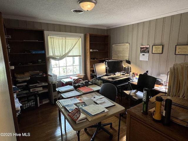 office featuring crown molding, wood finished floors, and a textured ceiling