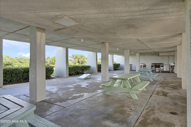 view of patio featuring outdoor dining area