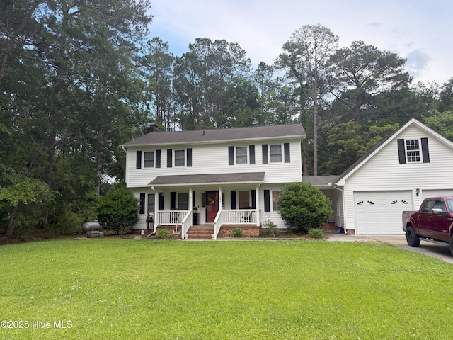 view of front of property with covered porch, driveway, a front lawn, and a garage