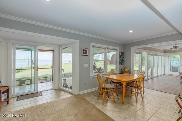 4512 Rivershore Dr, New Bern, NC 28560 - dining room with light tile patterned flooring, crown molding, baseboards, ceiling fan, and recessed lighting