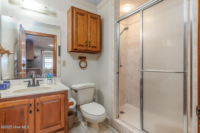 4512 Rivershore Dr, New Bern, NC 28560 - bathroom featuring a stall shower, toilet, vanity, crown molding, and tile patterned floors
