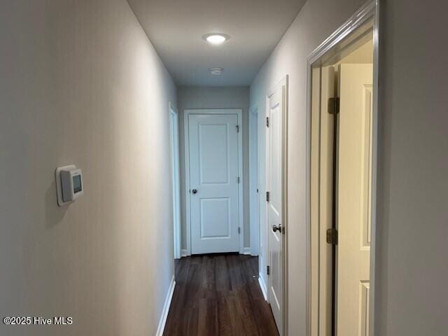 1120 Goldsboro Rd, Boiling Spring Lakes, NC 28461 - corridor with dark wood finished floors and baseboards