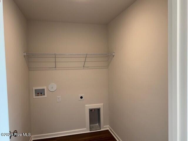 1120 Goldsboro Rd, Boiling Spring Lakes, NC 28461 - laundry area featuring hookup for an electric dryer, hookup for a washing machine, dark wood-style floors, and hookup for a gas dryer