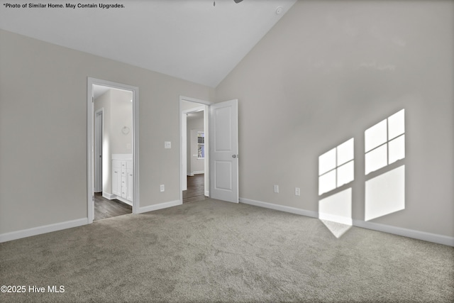 157 Tides End Dr, Holly Ridge, NC 28445 - unfurnished room featuring carpet, baseboards, and high vaulted ceiling