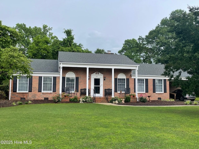 205 Queen Anne Dr, Edenton, NC 27932 - greek revival house with a front lawn, crawl space, brick siding, and a shingled roof