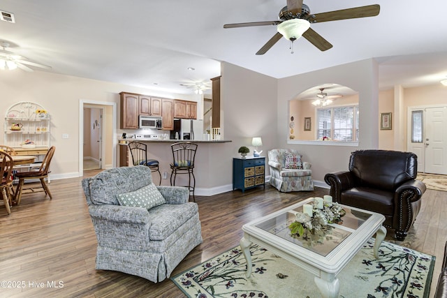 203 Abbey Ln, Wilmington, NC 28411 - living room featuring ceiling fan, wood finished floors, and baseboards